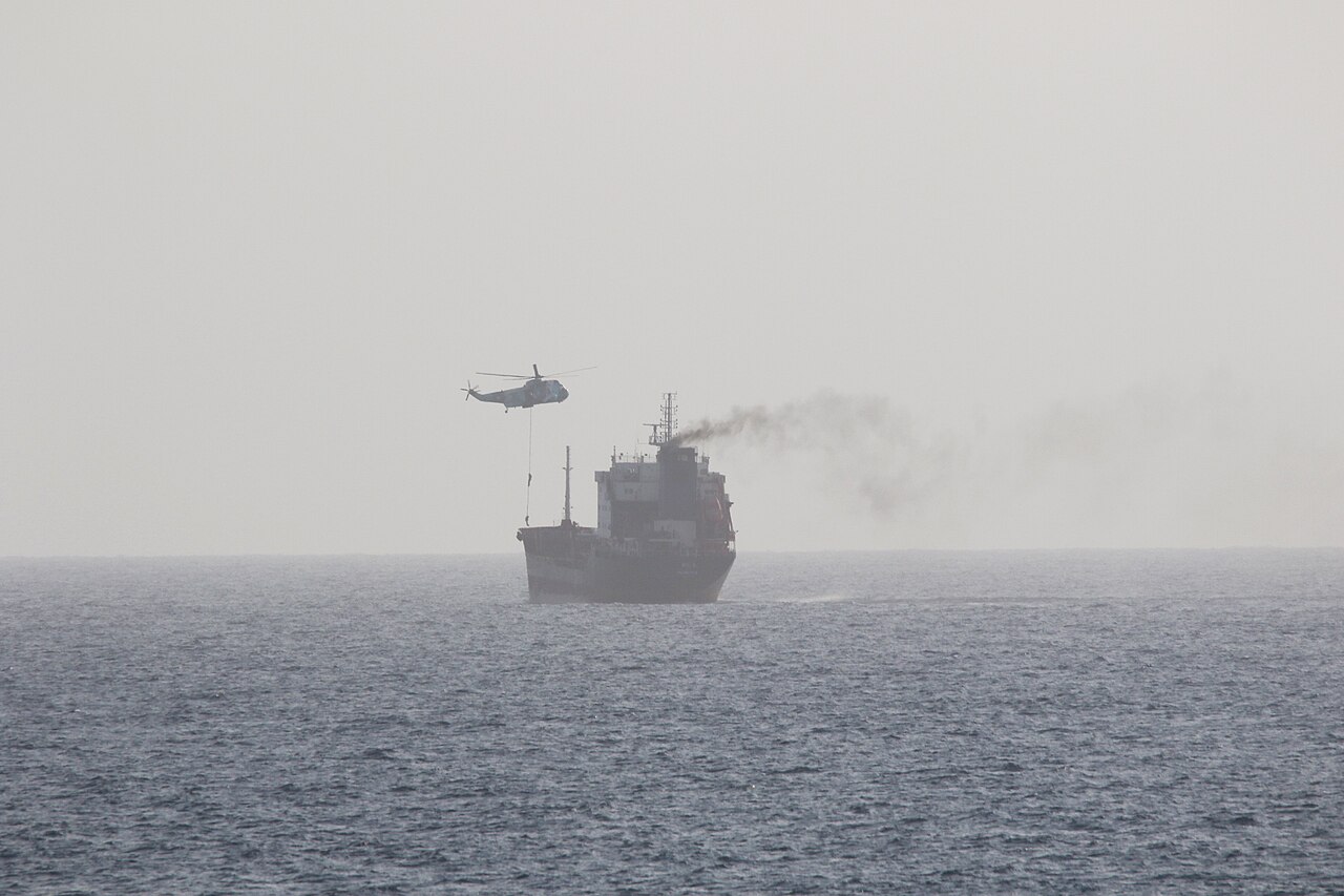 Iranian naval forces boarding a tanker during maritime interdiction risk analysis